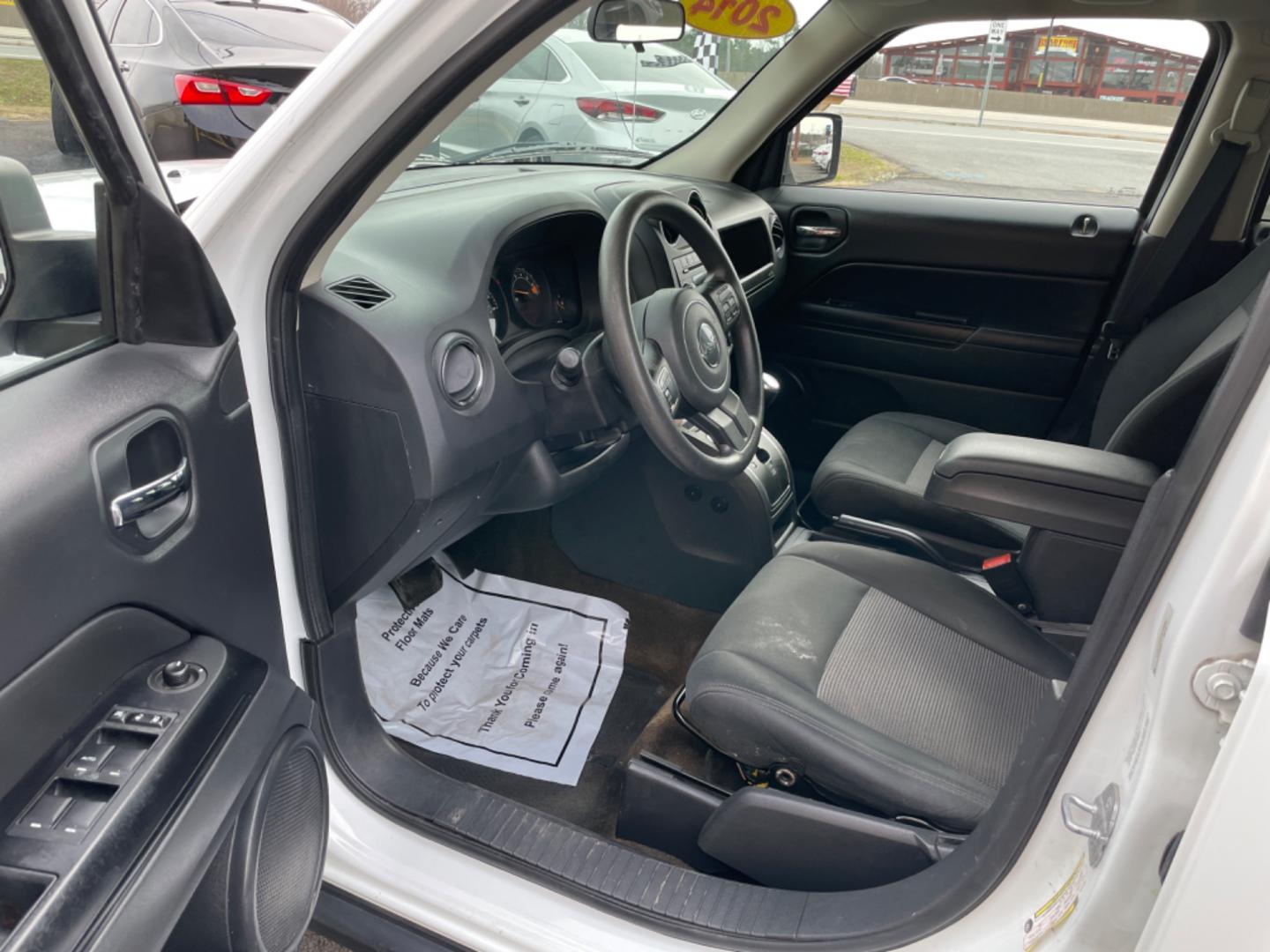 2014 White Jeep Patriot (1C4NJPBAXED) with an 4-Cyl, 2.0 Liter engine, Automatic, 6-Spd w/AutoStick transmission, located at 8008 Warden Rd, Sherwood, AR, 72120, (501) 801-6100, 34.830078, -92.186684 - Photo#12